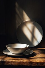 Minimalist Still Life - Bowl and Plate Bathed in Dramatic Sunlight.