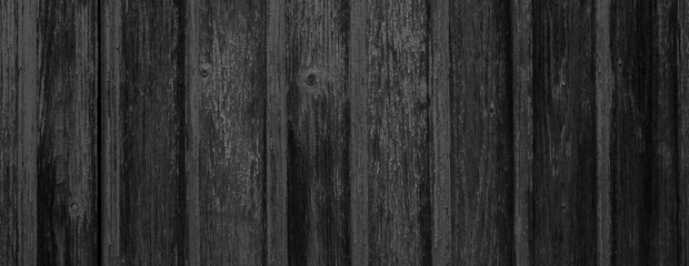 Dunkle Holzbretter als rustikaler Hintergrund