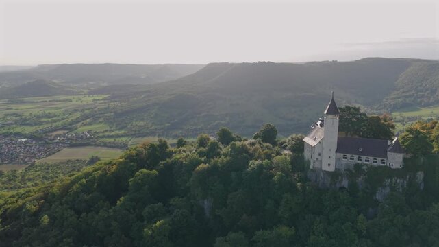 A flight above Dettingen Teck towards the Castle Teck which is located high above the mountain 