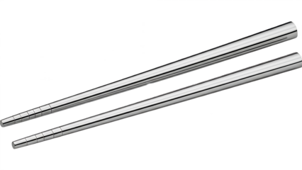 A pair of metal chopsticks angled diagonally against a dark background with a subtle reflective sheen