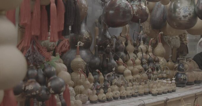 Chengdu, Sichuan, China. Ungraded C LOG 2, Souvenir Pumpkins. Souvenirs From Bottle Gourd Or Calabash. Chinese Souvenir Shop. Opo Squash, Calabash Or Hulu - Traditional Chinese Bottle Gourd Is Ancient