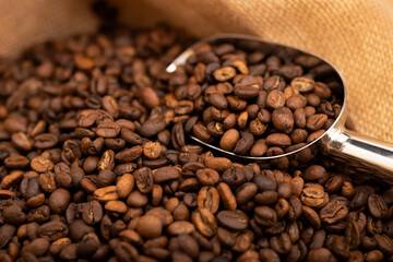 Roasted coffee beans with bag and scoop , Can be used as a background