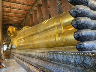 Fototapeta premium Historic Wat Pho Temple with Reclining Buddha in Bangkok