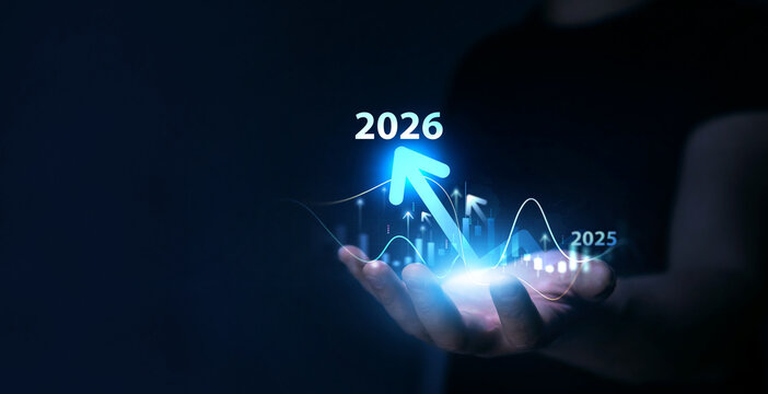Business person draws increase arrow graph corporate future growth year 2025 to 2026.Business plan for increase in 2026 year.Development to success and motivation in new year 2026.