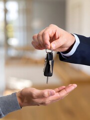 Handing Over Keys - New Home Ownership or Rental Agreement Concept