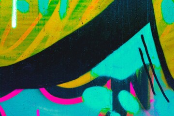 Funky graffiti art in bright blue, pink, yellow with bold lines. Neon 80s style, fluorescent colors, urban street vibe. Modern 90s, Y2K creative banner, digital art, fashion visuals.