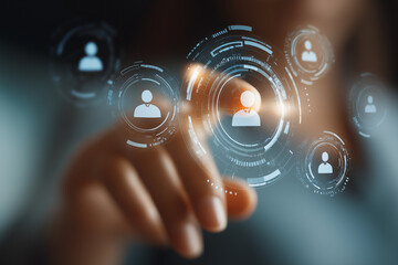 Hand touching digital interface with holographic customer segmentation model, futuristic technology, data analysis, business strategy, and innovation concept