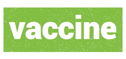 vaccine text written on green stamp sign.