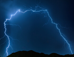 Massive Lightning Bolt Illuminating Night Sky