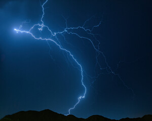 Massive Lightning Bolt Illuminating Night Sky