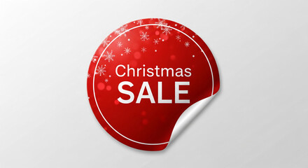 Red round sticker with snowflake pattern and text "Christmas SALE", featuring a curled corner, symbolizing promotion and special holiday shopping event