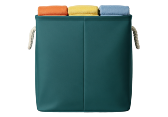 Isolated teal laundry basket with towels for home decor and storage; studio shot, close-up