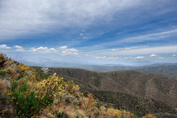 Vast Mountain Valley Landscape With Red Rock Formation