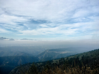 Misty Mountain Valley Overlooking Rolling Hills and Cloud Inversion