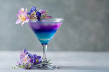 Thai butterfly pea gin cocktail, vibrant blue and purple gradient, elegant martini glass, decorated with tropical flowers