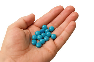 Hand holding blue pills, representing medical treatment, dose, and medication for healthcare on transparent background