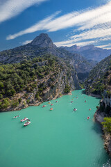 Gorges du Verdon turquoise water with boats and rocky mountains