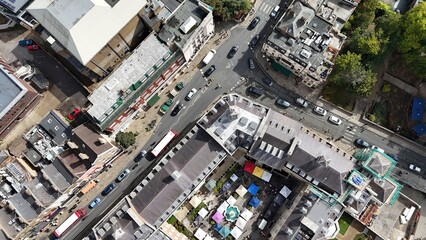 Fototapeta premium Overhead birds eye aerial view Colourful Outdoor Market Stalls and high street Richmond Town Centre UK