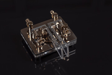 Iambic paddle key on a black background close-up © vladimir subbotin