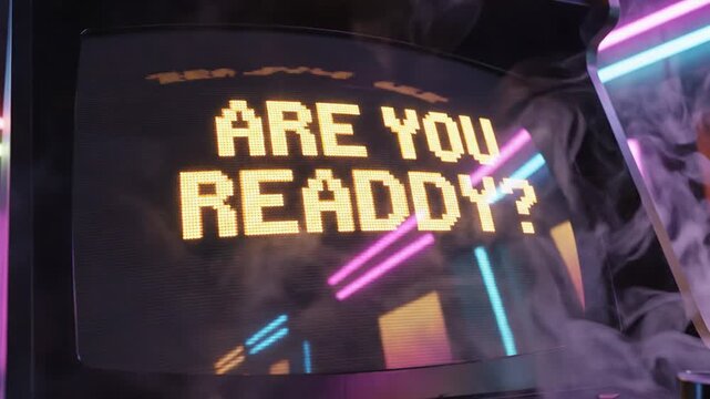 Retro Arcade Game Start Screen with Are You Ready Message and Neon Lights.