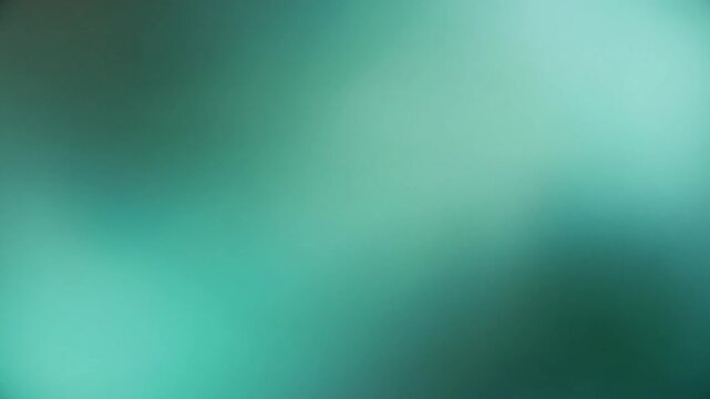 パステルアクアのフレアが穏やかに広がり、フィルムが溶けるような柔らかなメルト効果がドリーミーな雰囲気を生む映像素材です。