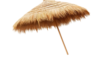 Straw beach umbrella providing shade at a sunny seaside location during the summer.