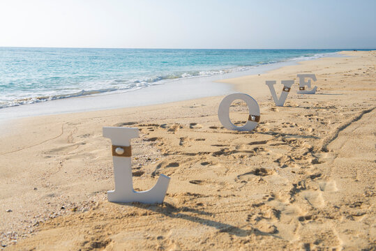 Romantic love sign on a tropical beach paradise