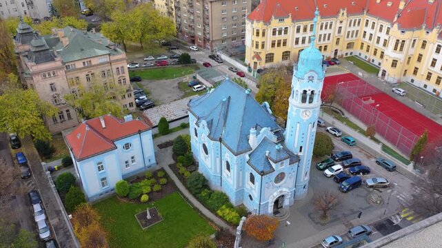 4K cinematic drone footage of the Blue Church in Bratislava, highlighting the building&rsquo;s distinctive blue colors, decorative mosaics, and curved architectural shapes in the heart of Bratislava._19