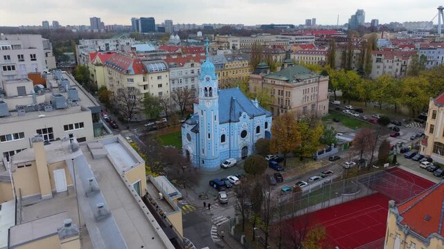 4K cinematic drone footage of the Blue Church in Bratislava, highlighting the building&rsquo;s distinctive blue colors, decorative mosaics, and curved architectural shapes in the heart of Bratislava._05