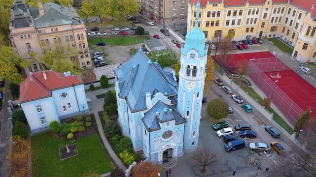 4K cinematic drone footage of the Blue Church in Bratislava, highlighting the building&rsquo;s distinctive blue colors, decorative mosaics, and curved architectural shapes in the heart of Bratislava._14