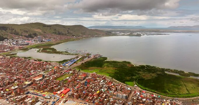Puno city on shore of Lake Titicaca in Peru the birthplace of Inca Empire