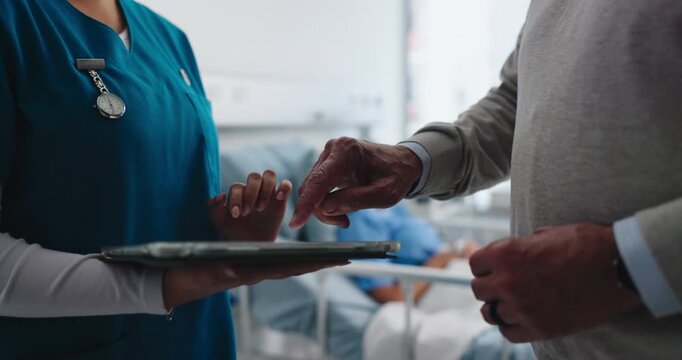 Hands, tablet and senior person in hospital with nurse, patient and consent for cancer treatment. Recovery, consultation and couple in clinic with tech, advice or inform for surgery in retirement