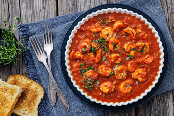 Shrimp in hot tomato sauce with garlic, onion