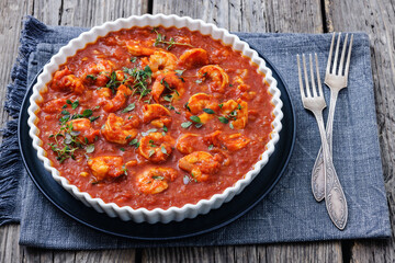 Shrimp in hot tomato sauce with garlic, onion