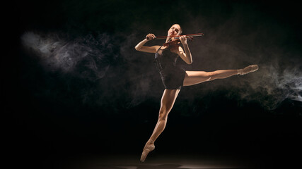 Jumping ballerina playing violin in smoky stage environment. Concept of hybrid dance-music performance, theatre promotion, culture visuals, art education materials, expressive movement designs. © Lustre Art Group 
