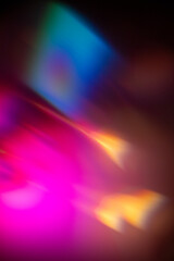 vibrant abstract light patterns with blurred colors creating a dynamic visual effect, neutral background, clear negative space, clean composition, balanced framing, minimalist layout, editorial