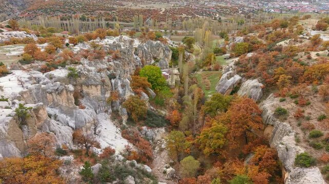 Aerial view of ancient rock formations and vibrant autumn hues in the Phrygian (Frig) Valley in Afyonkarahisar