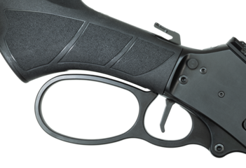 Black lever action receiver seen directly from the side