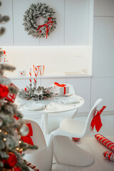 festive table setting with holiday decor and christmas tree celebration