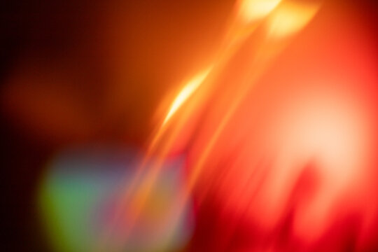 abstract light patterns with vibrant hues of red and orange creating a dynamic visual effect, neutral background, clear negative space, clean composition, balanced framing, minimalist layout