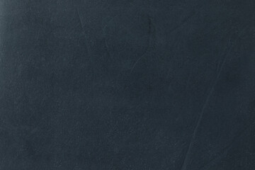 Old leather fabric texture, macro close-up. Suitable for use as a background, overlay, or design element in various creative projects