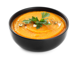 Tasty pumpkin cream soup with parsley in bowl isolated on white