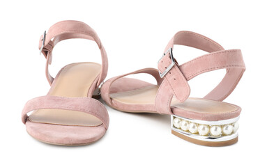 Pair of stylish pink shoes isolated on white