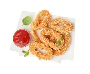 Deep fried squid rings, basil and ketchup isolated on white, top view