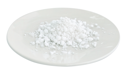 Calcium chloride crystals on a clean white plate isolated with sharp reflections transparent background. Generative AI