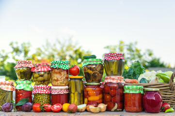 Jars with preserved vegetables for the winter. Selective focus.