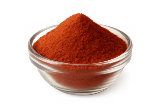 Paprika powder presented in a glass bowl; an essential spice for enriching various dishes, ideal for cooking concepts. Transparent background