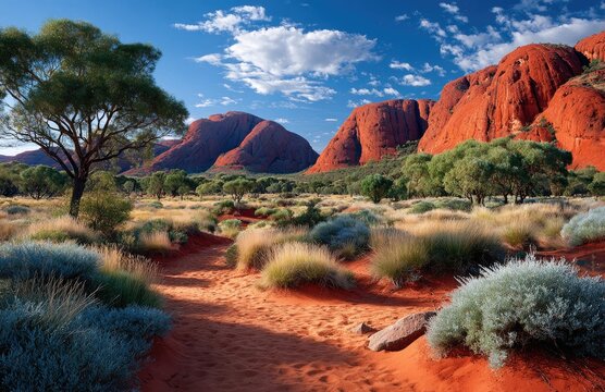 the iconic rock formations at avonite in australia, featuring three large red rocks standing side by side against a clear blue sky. - Powered by Adobe