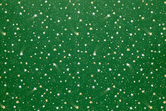 green christmas background with silver and gold stars,seamless pattern of stars on green background,Christmas wrapping paper, Xmas background with ornaments pattern, Festival element, Happy New Year