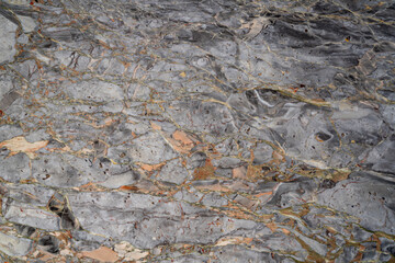 High resolution natural marble texture with grey, beige and gold veining, detailed polished stone surface pattern for interior design materials, architectural backgrounds and decorative applications